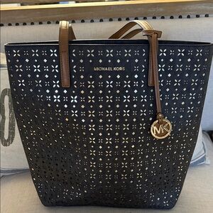 Michael Kors Black Perforated Tote with Brown Trim and Gold MK Charm